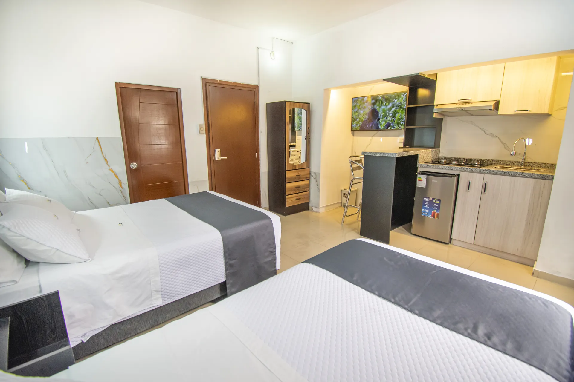Monoambiente con 2 camas, baño privado y cocina